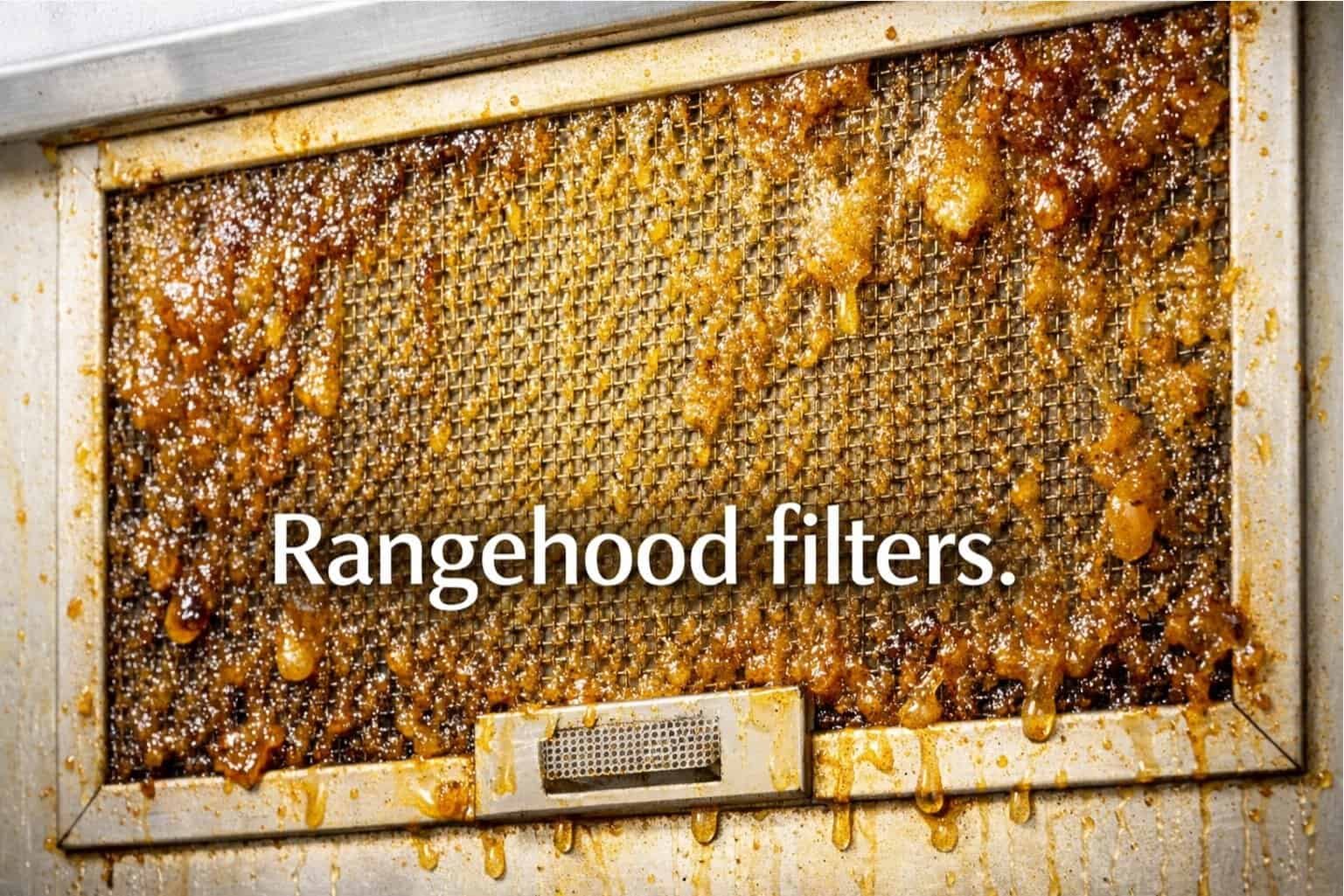 WhatsApp Image 2026-03-10 at 4.07.34 PM (7) Dirty kitchen range hood filter before deep cleaning. Grease and grime build-up on the mesh filter. Google Ads deep cleaning example.